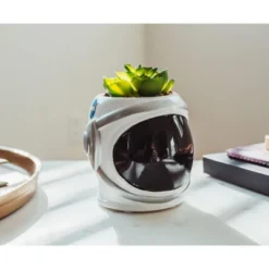 Silver Buffalo NASA Space Helmet 6-Inch Ceramic Planter With Artificial Succulent